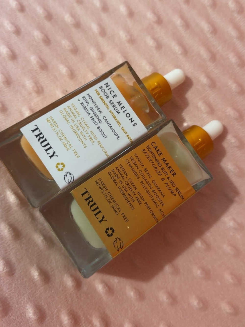 TRULY Brightening Serum Duo in Peach and Gold Dropper Bottles